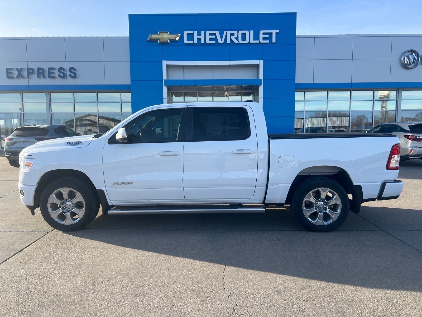 2022 RAM 1500 Big Horn in White — front three-quarter view