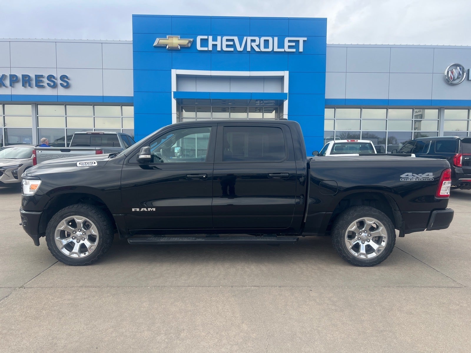 2020 RAM 1500 Big Horn in Black — front three-quarter view