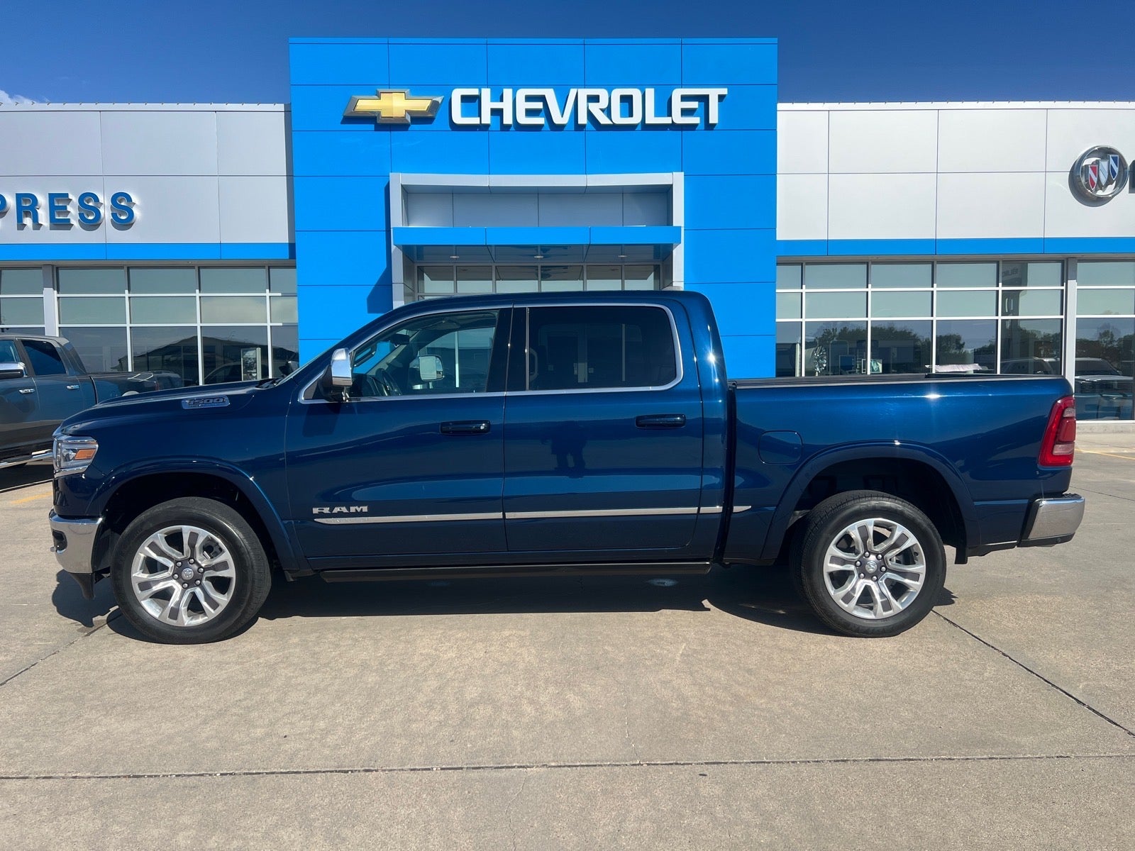 2024 RAM 1500 Limited in Dk Blue — front three-quarter view