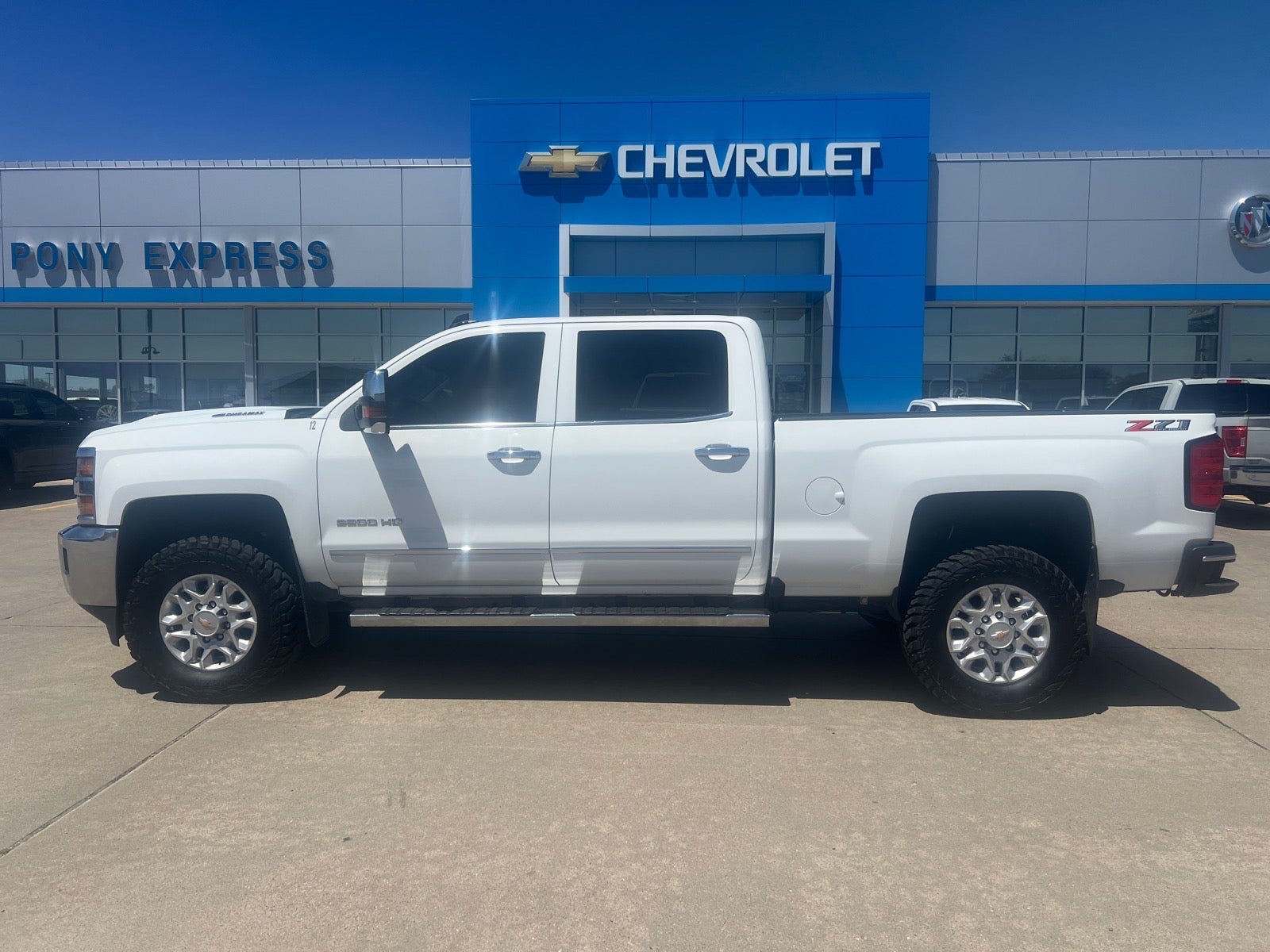 2019 Chevrolet Silverado 2500 HD LTZ in Summit White — front three-quarter view