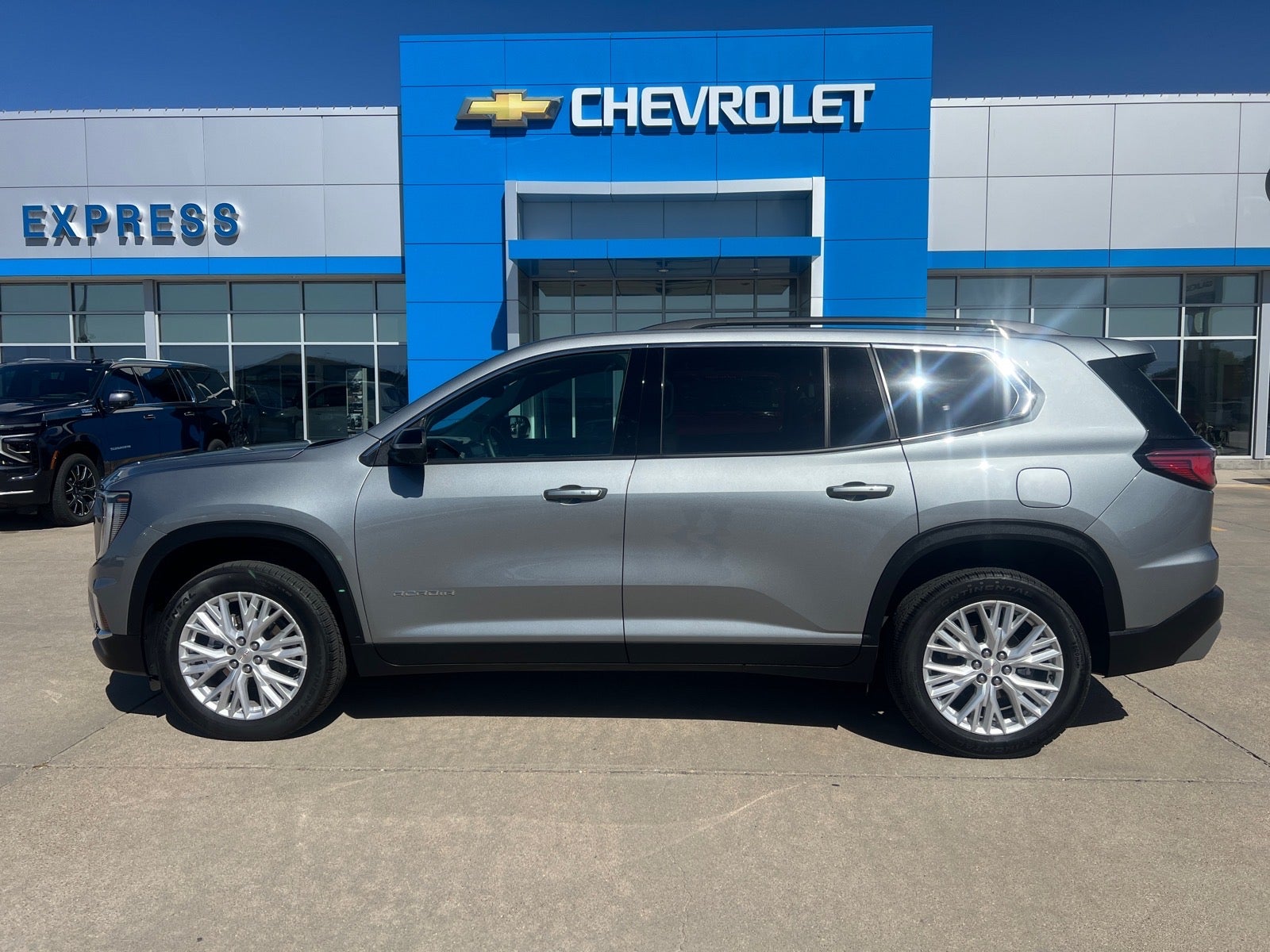 2026 GMC Acadia Elevation in Sterling Metallic — front three-quarter view
