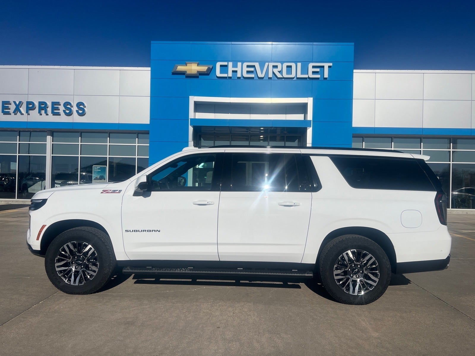 2026 Chevrolet Suburban Z71 in Summit White — front three-quarter view