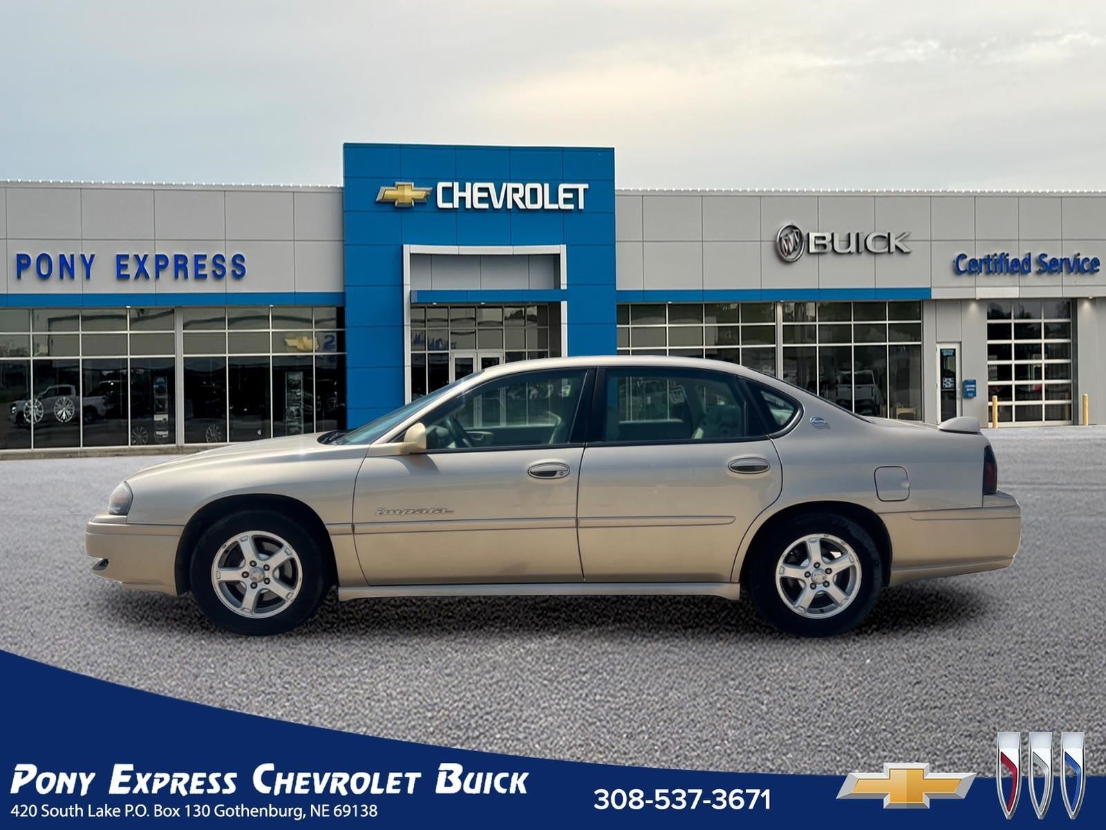 2004 Chevrolet Impala LS in Sandstone Metallic — front three-quarter view