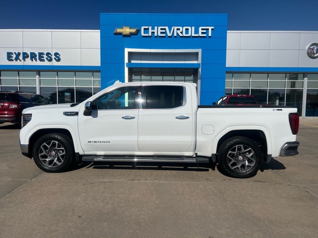 2023 GMC Sierra 1500 SLT in Summit White — front three-quarter view