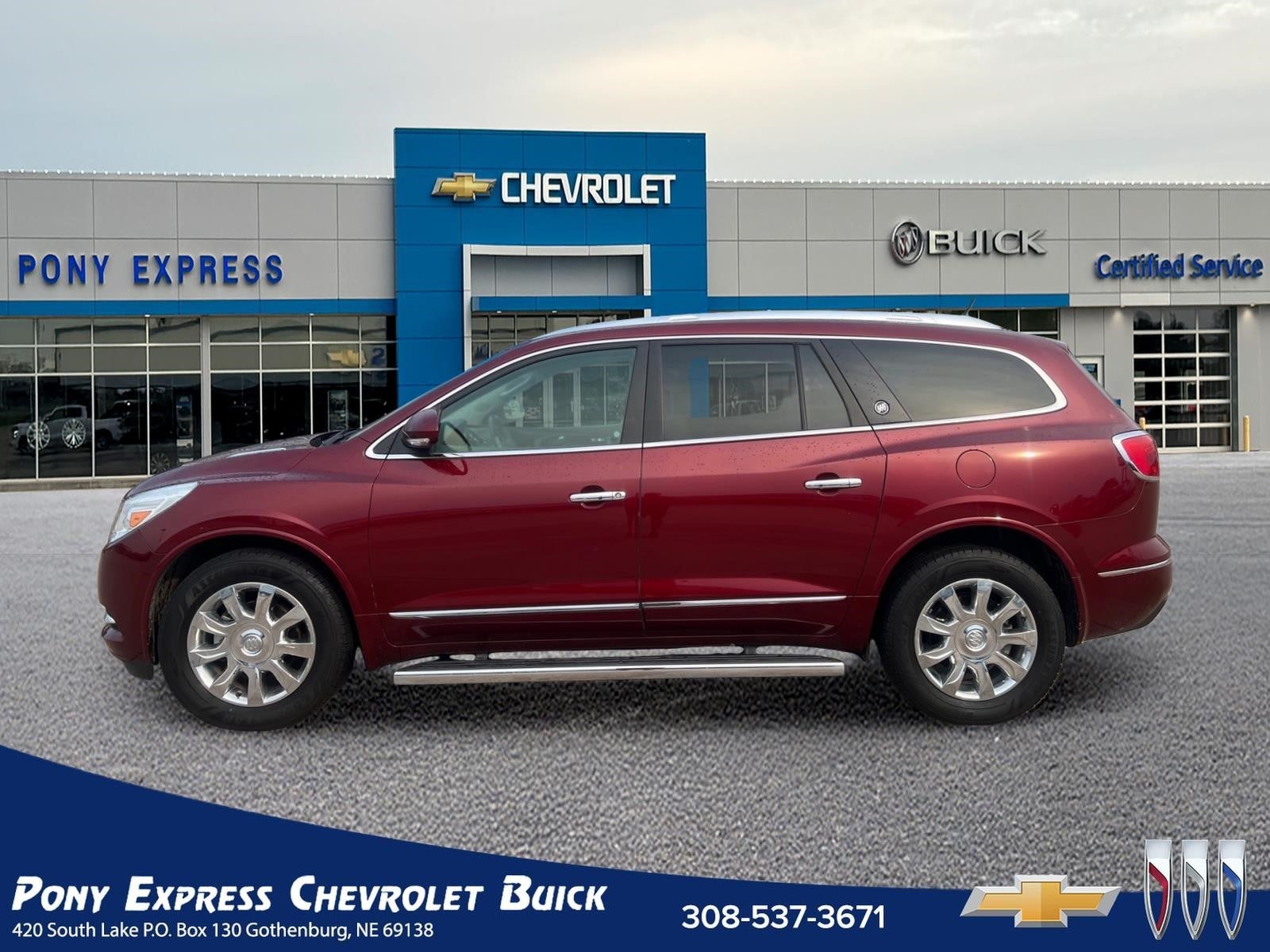 2017 Buick Enclave Premium in Crimson Red Tintcoat — front three-quarter view